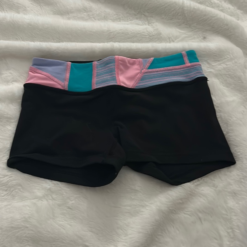 black pink and turquoise reversible girls booty shorts